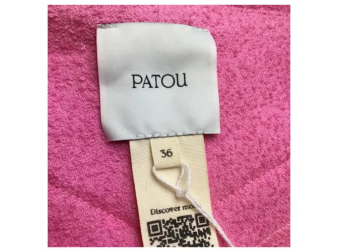 Autre Marque Patou Begonia Pantalón acampanado de tweed en mezcla de algodón rosa 