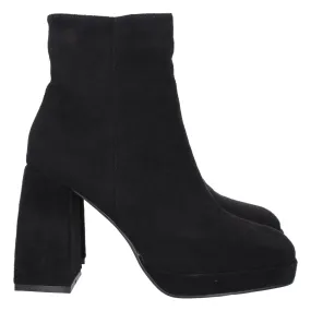 Comfortable wide heel black women's ankle boots.